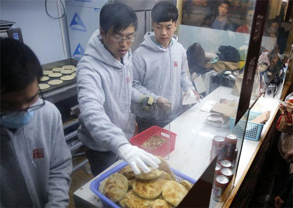 北京4名IT男改賣肉夾饃日入萬元